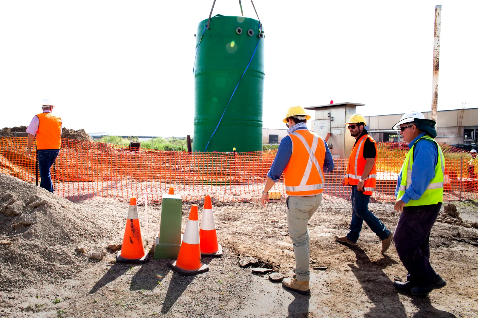Installation crew on site as the Mullaly FRP wet well is lifted into place at Lotus Glen